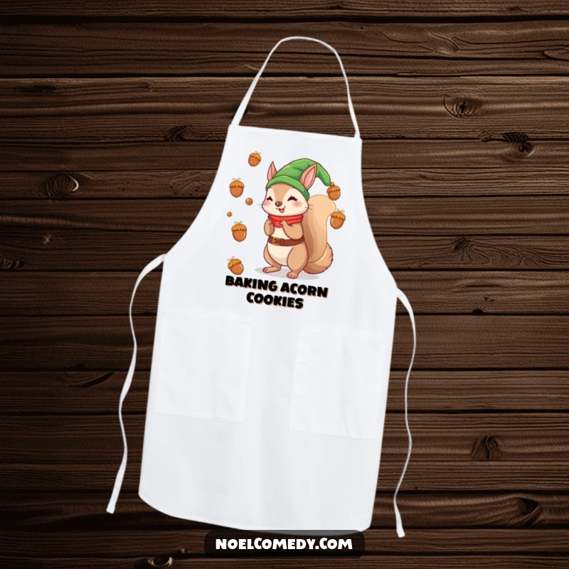 Funny apron with a squirrel elf tossing acorns like ornaments, ideal for holiday baking fun.