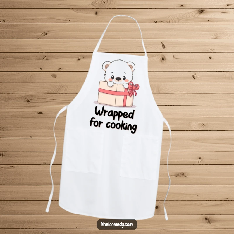 Funny Apron: A curious polar bear cub peeking from behind a gift, ready to 'unwrap' culinary delights with a smile.