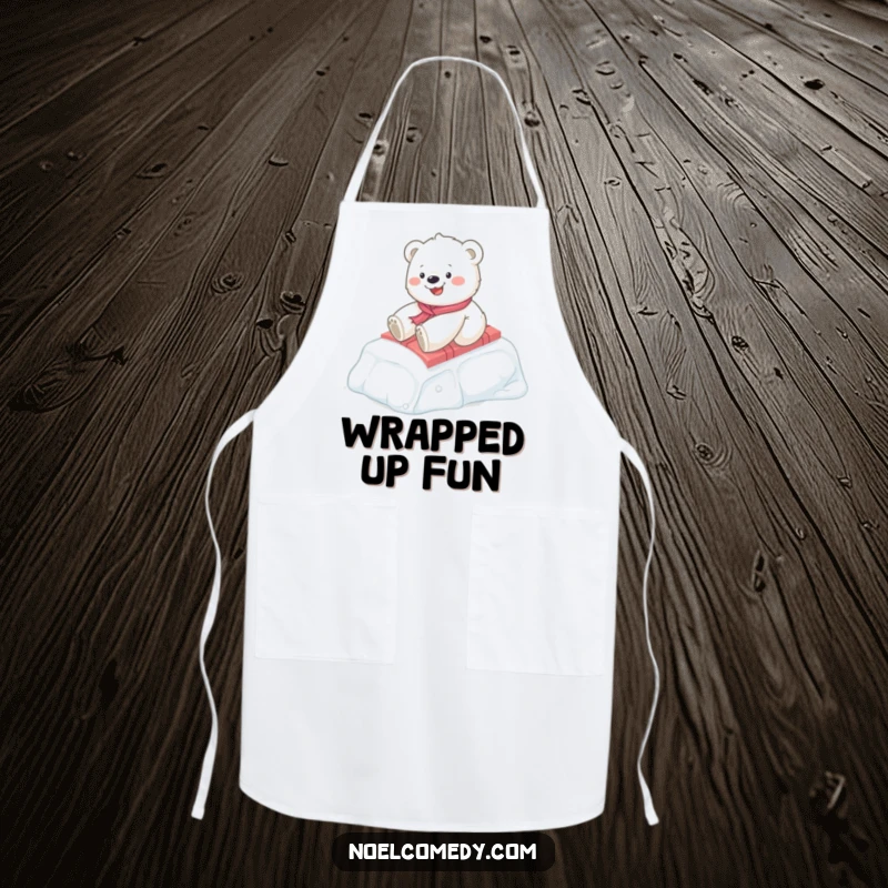 Funny Polar Bear Cub Kitchen Apron: A happy cub slides on a gift box, bringing winter fun to cooking, a practical and funny gift.