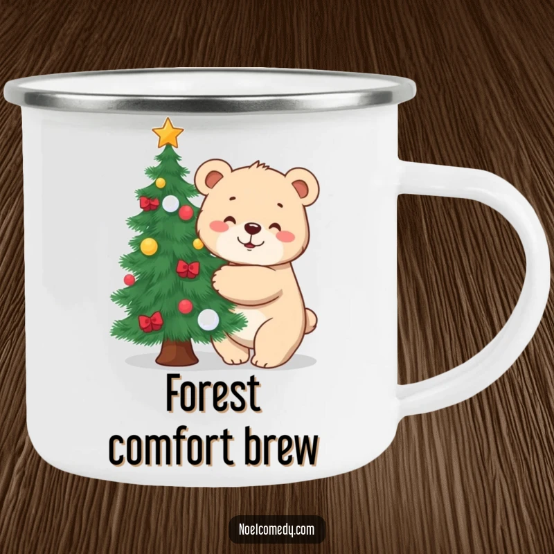 Funny camping mug showing a cheerful bear cub hugging a decorated pine tree, designed for rustic holiday enjoyment.