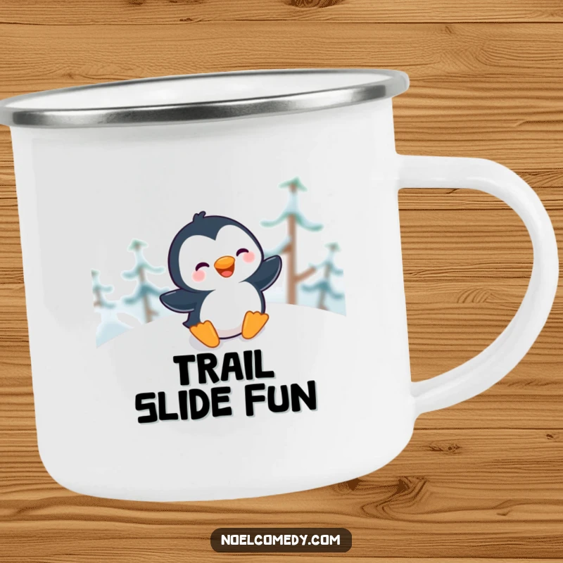 Funny Camping Mug featuring a giggling penguin sliding gleefully down a snowy hill, great for winter camping.