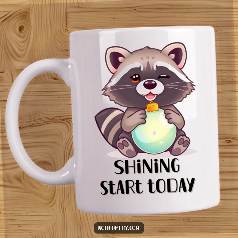 Funny mug featuring a mischievous raccoon winking and holding a shiny, festive Christmas ornament, full of holiday spirit.