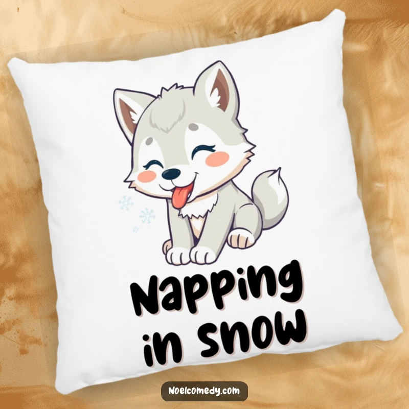 Funny pillow depicting a playful wolf pup catching snowflakes, adding whimsical winter comfort to any room.
