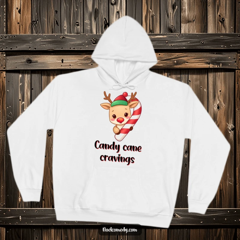 Funny cute reindeer with a glowing red nose, peeking from around a giant candy cane, featured on a cozy holiday hoodie.
