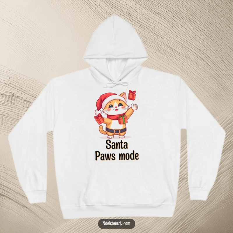 Funny cheerful Santa cat juggling tiny wrapped gift boxes, featured on a cozy holiday hoodie for warmth and fun.
