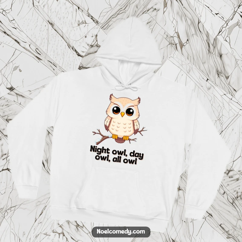 Funny hoodie featuring a happy, wide-eyed owl perched on a snowy branch. Cozy and enchanting winter wear.