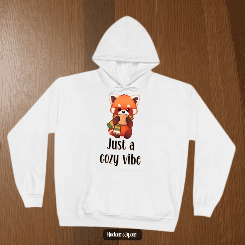 Funny Hoodie: A charming red panda wearing a festive scarf holds a warm mug, embodying comfort and humor in a wearable design.