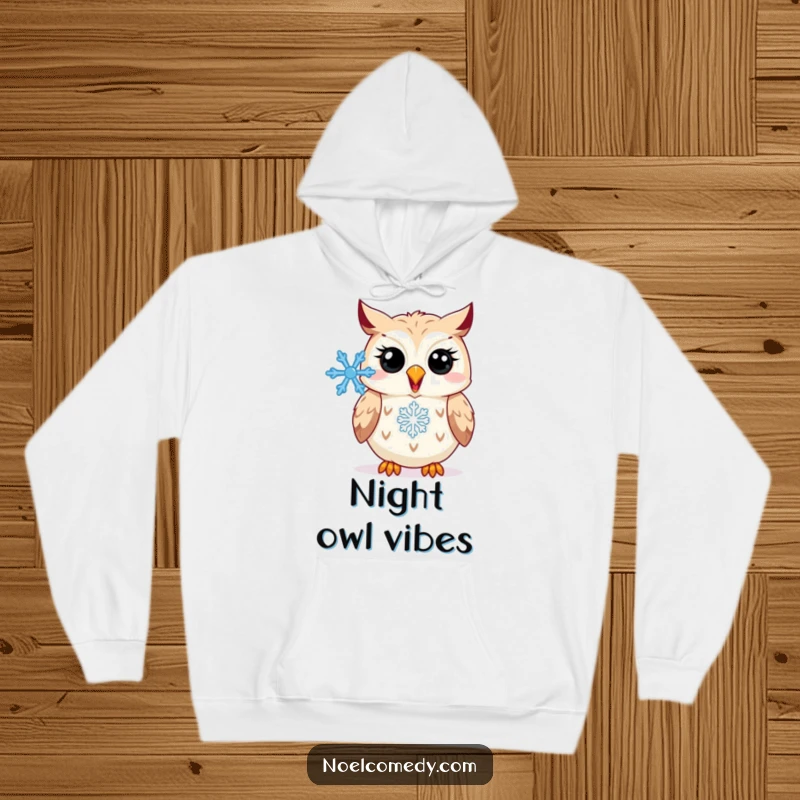 Funny Hoodie: A happy owl hooting with a snowflake, offering cozy winter comfort and humorous charm.