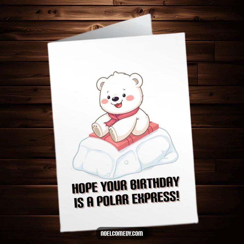 Funny Free Printable Birthday Card: A happy polar bear cub slides down an icy hill, riding joyfully on a wrapped present.