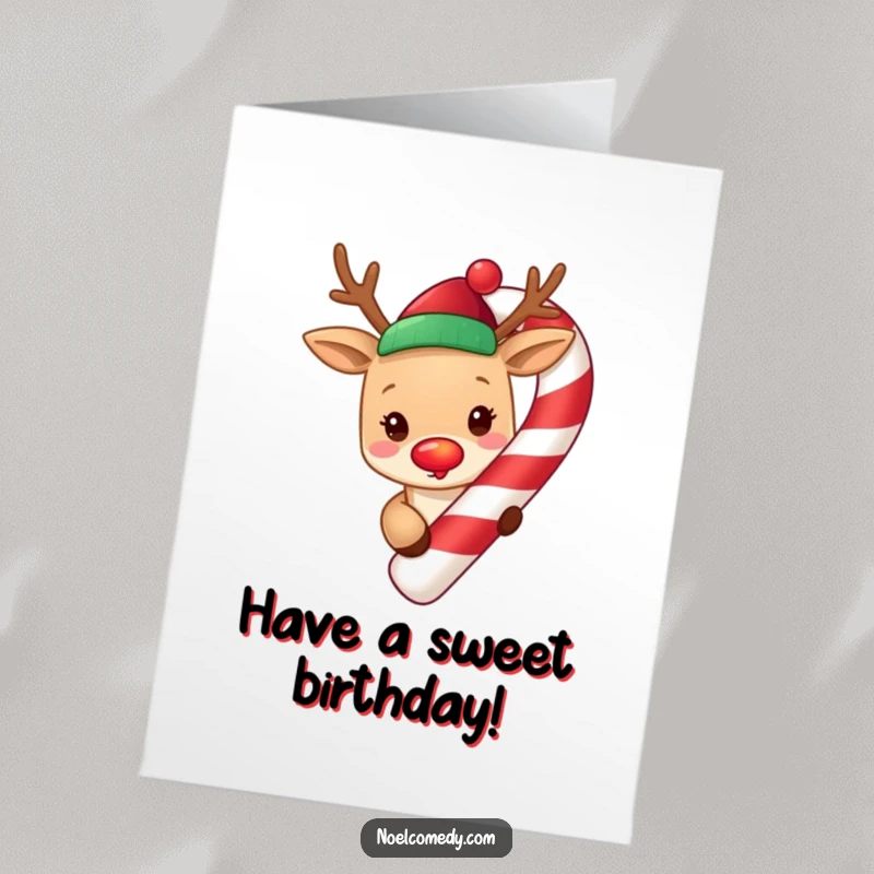 Funny Free Printable Birthday Card: Cute reindeer with a glowing red nose peeks around a giant, striped candy cane.