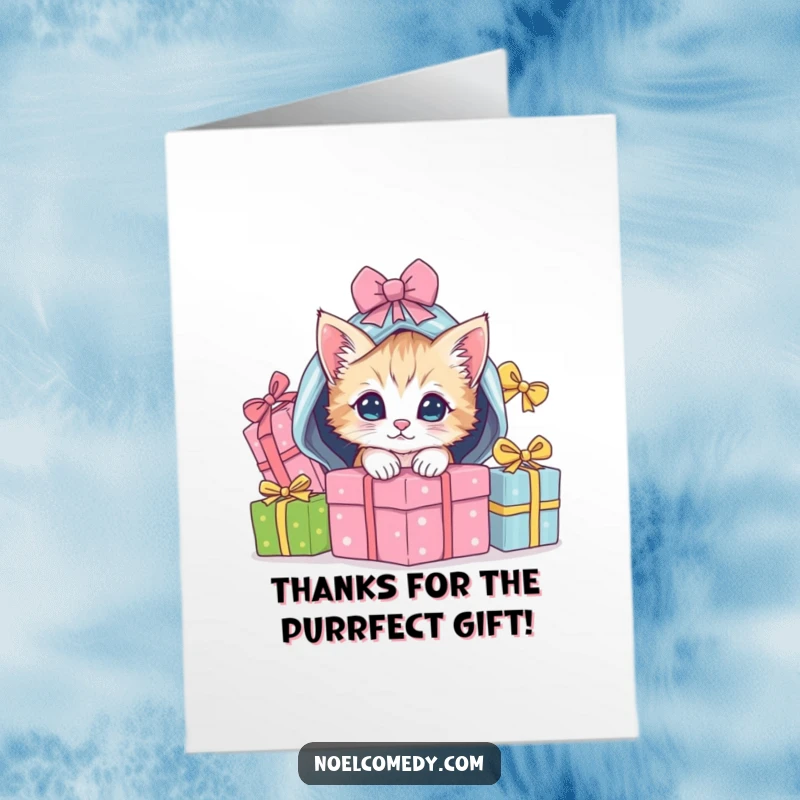 Funny Free Printable Thank You Card: A playful kitten emerges from under wrapped gifts, offering a cute and humorous thank you.