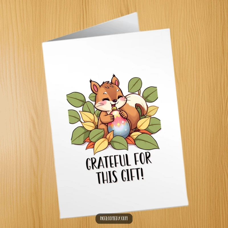 Funny Free Printable Thank You Card: A giggling squirrel hides a shiny ornament in leaves, making a humorous thank you gesture.