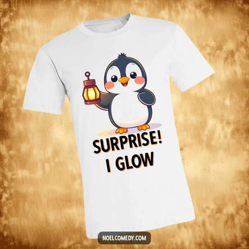 Funny t-shirt graphic of a happy penguin looking genuinely surprised while holding a brightly glowing lantern, suggesting a wondrous discovery.