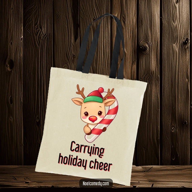 Funny cute reindeer with a glowing red nose, peeking from around a giant candy cane, printed on a festive tote bag.