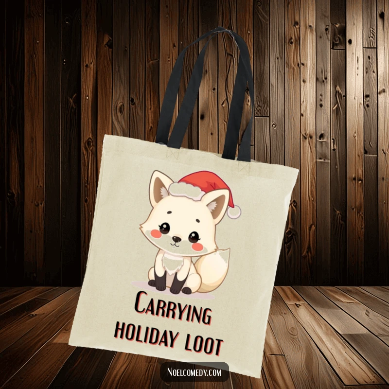 Funny arctic fox tote bag showcasing a playful fox wearing a tiny Santa hat, perfect for carrying holiday items with flair.