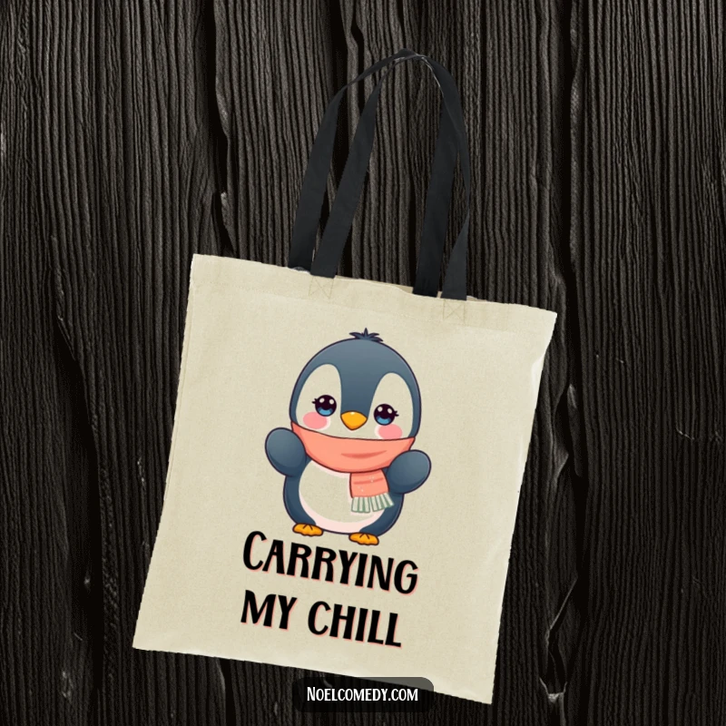 Funny tote bag featuring a delightful penguin character wearing a scarf and mittens, perfect for carrying winter necessities.