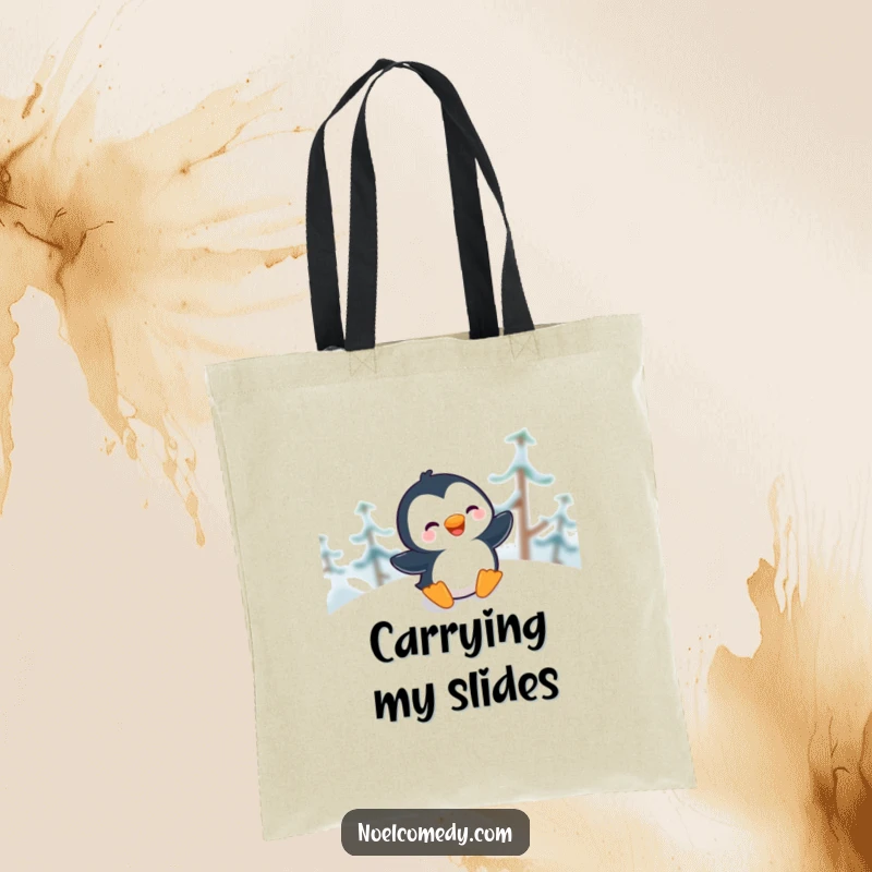 Funny Tote Bag featuring a giggling penguin sliding gleefully down a snowy hill, a delightful winter accessory.