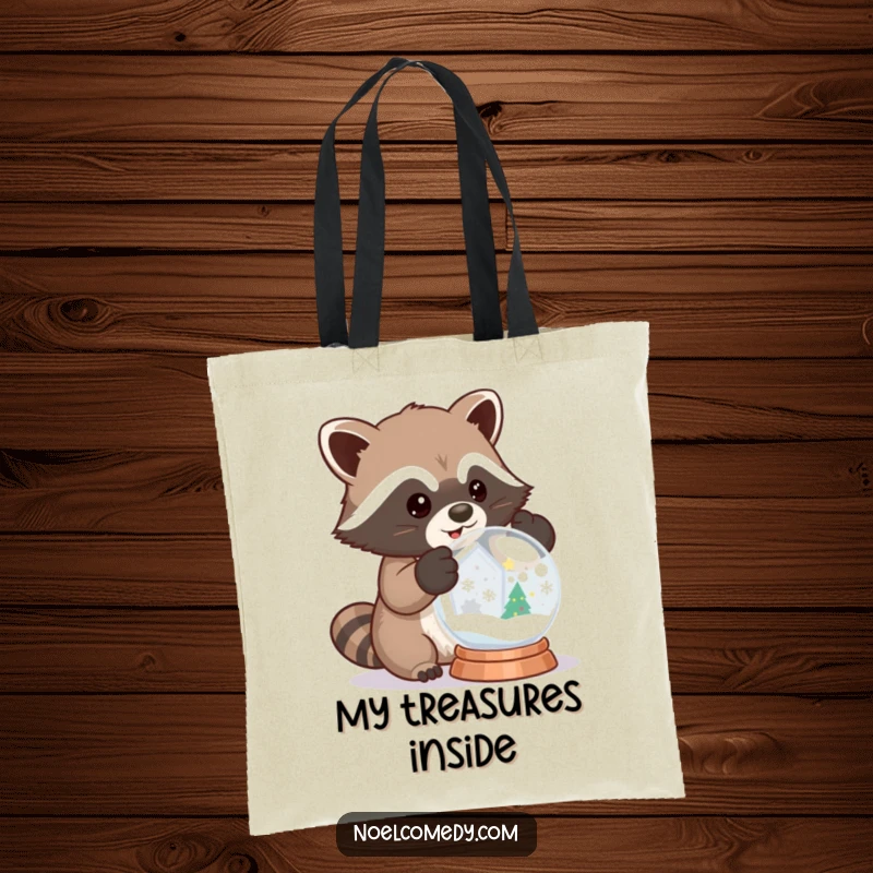 Funny tote bag with a raccoon in mittens shaking a snow globe, perfect for carrying winter essentials.